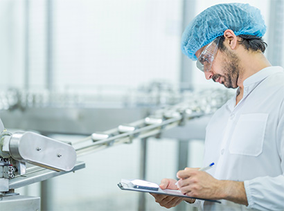 A man that is controlling the results that were made with a Dertec Motor